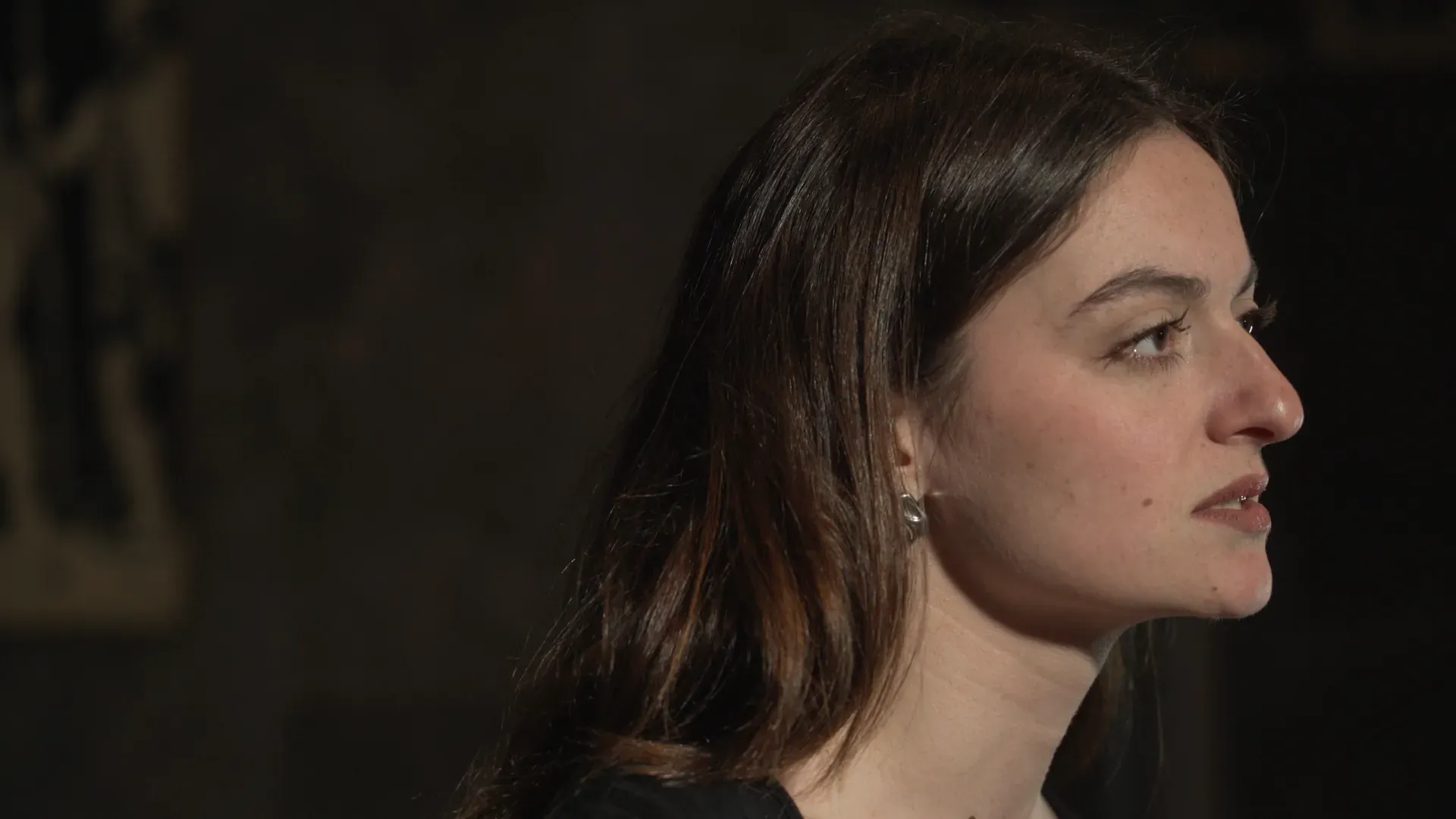 A young woman in profile